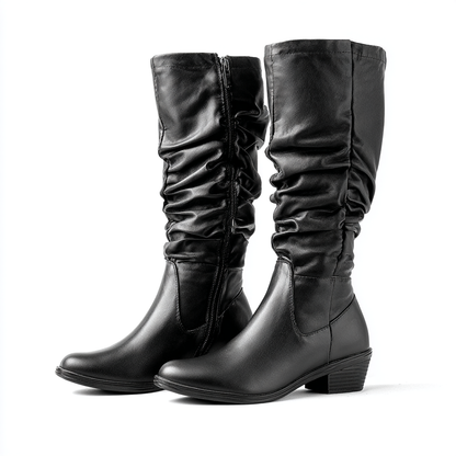 Damskie kozaki za kolano na niskim obcasie zapinane na zamek.